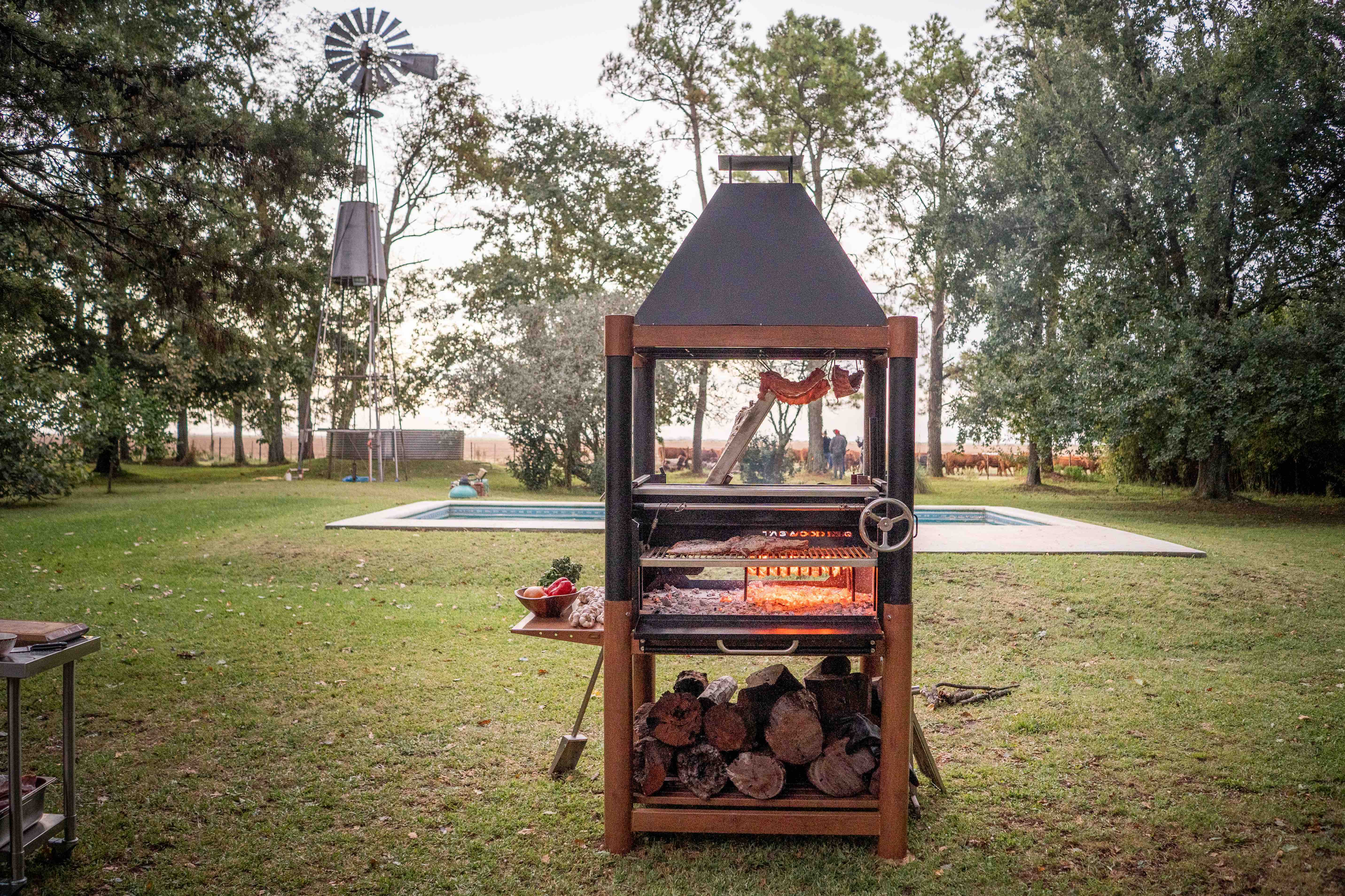 Argentine Charcoal Grill with Firebox Adjustable Grates Fire bricks and 6 Grilling Surfaces Tagwood BBQ02SI - PRE-ORDER